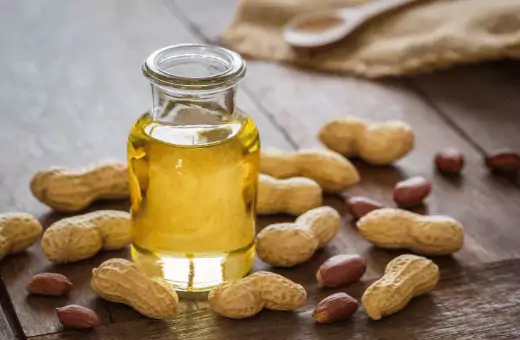 peanut oil is a healthier alternative to corn oil that is low in saturated fat.
