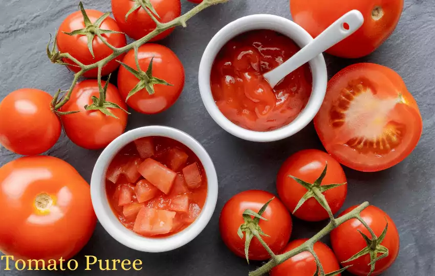 Tomato puree is a smooth, thick paste/sauce cooked down or strained to remove seeds. Tomato puree is the same thing with the water and tomato solids removed.