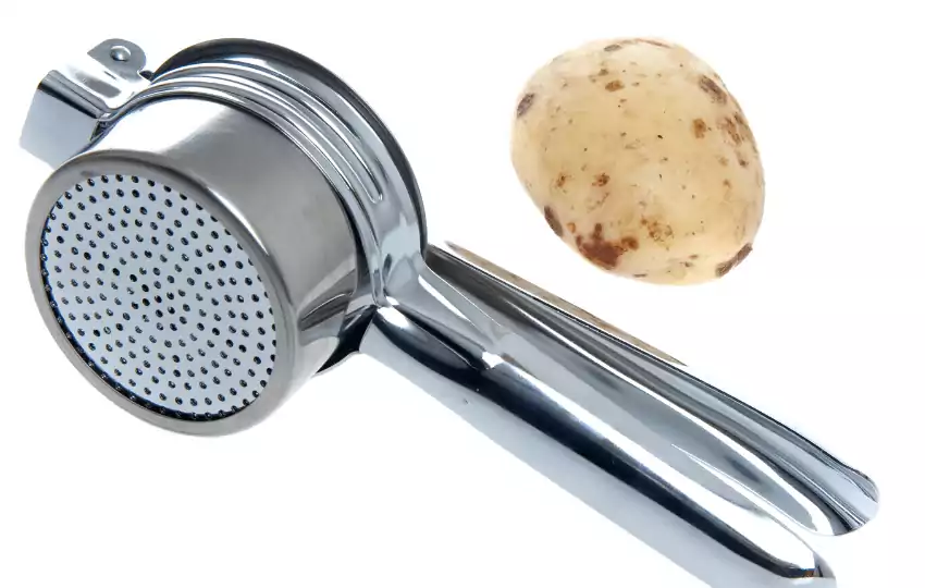 potato ricer is a kitchen tool utilized for mashed potatoes or other foods