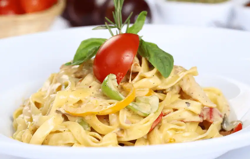 fettuccine pasta is a kind of pasta that is made from flour water and eggs
