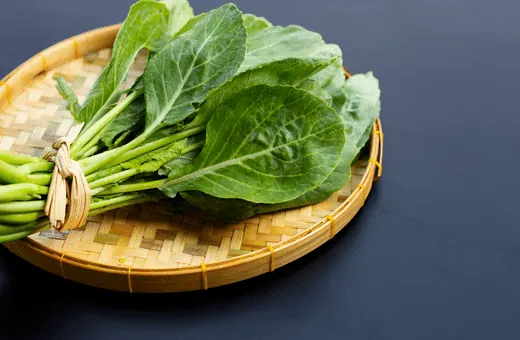 you can use collard green as a good frozen spinach substitute