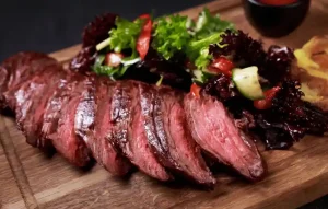 skirt steak is a lean cut of meat taken from the plate part of the cow