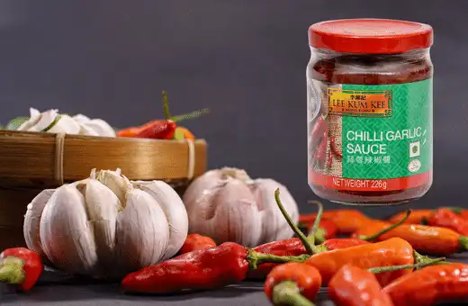 Chili garlic sauce is made with chili peppers, garlic, salt, and vinegar. It has a similar flavor to gochujang but isn't as spicy.