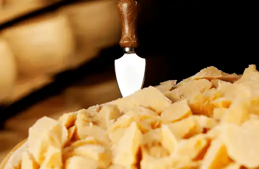 GRANA PADANO is a decent substitute for parmesan rind. 