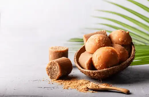 If you are looking to cut down on the sugar content of your recipe, jaggery is a good alternative to dates. 