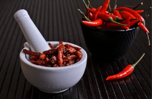try cayenne pepper as a perfect substitute for chile de arbol